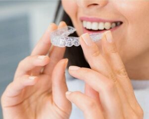 putting-on-invisalign